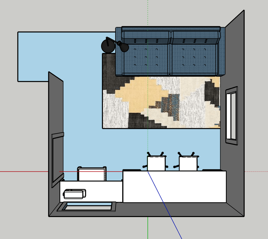 Planos de reforma de vivienda unifamiliar desplegados sobre mesa de trabajo con materiales